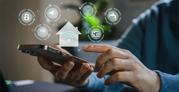 A person using a smartphone to control smart home features.