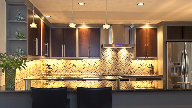 Modern kitchen with dark wood cabinets.