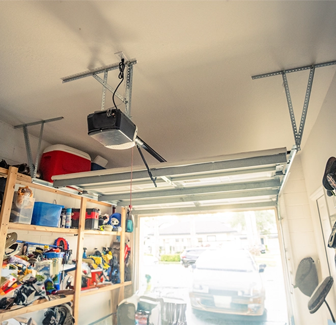 Interior view of a cluttered garage.