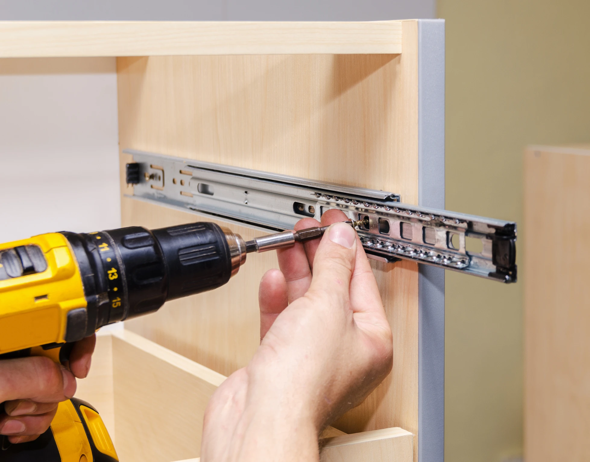 Handyman assembling a furniture piece